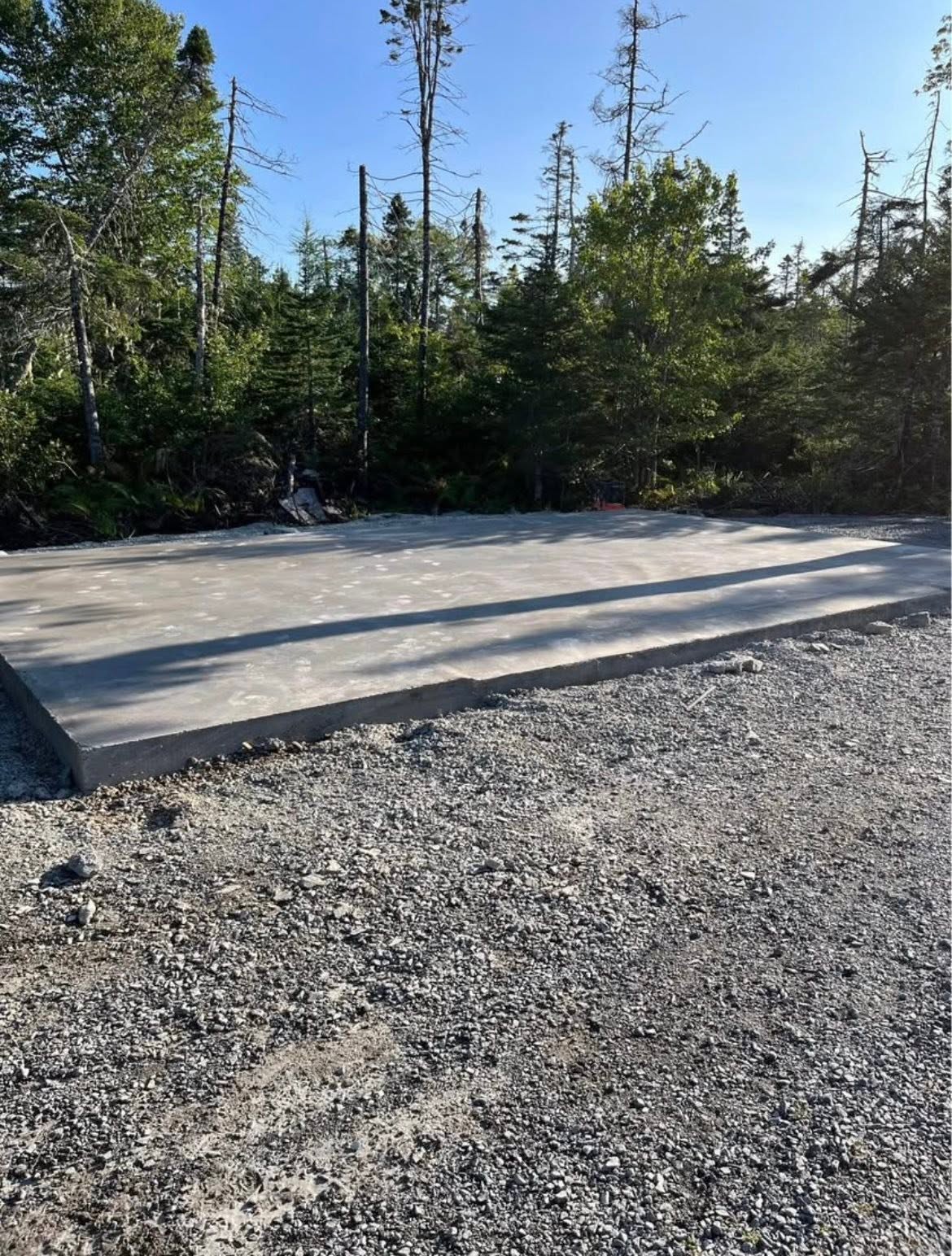 Finished concrete slab in a wooded setting