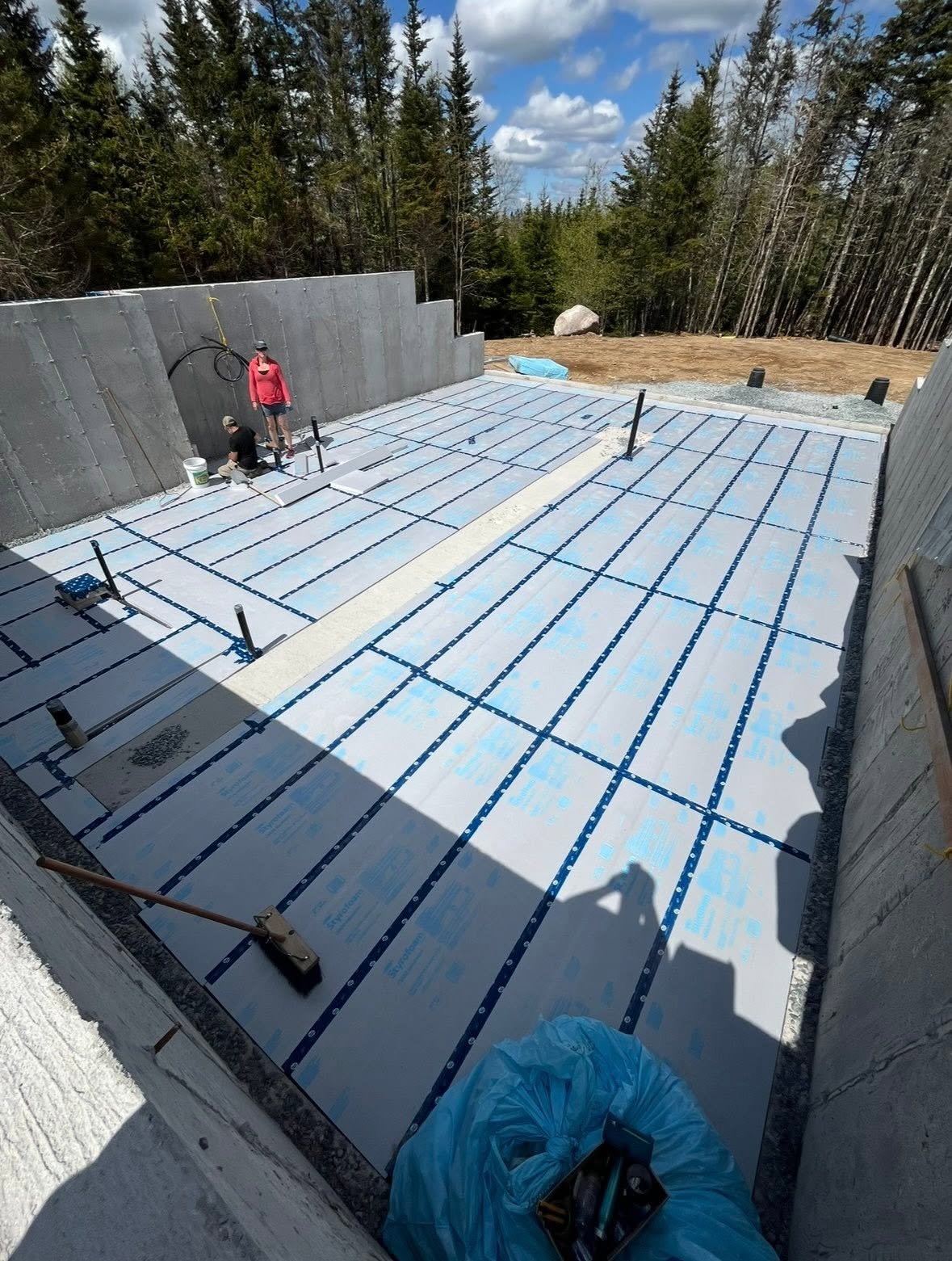 Insulated concrete foundation walls and floor preparation